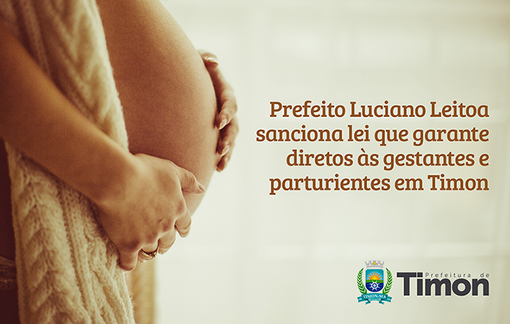 Pregnant woman holding her belly